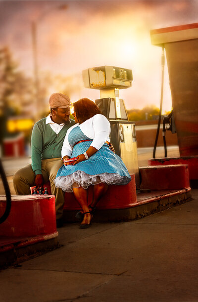 A couple sitting in a gas station with Nuka Cola