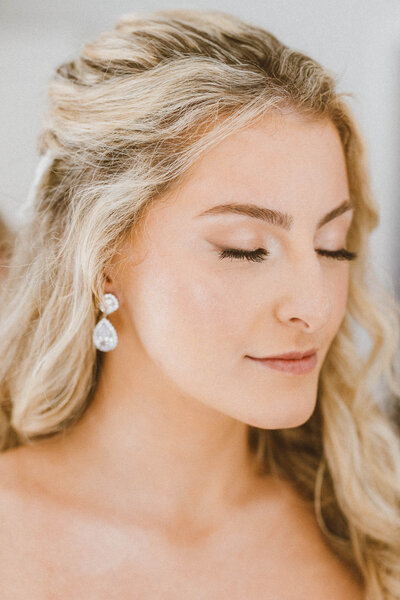 blonde bride closes her eyes as she reflects on her wedding day in Boston Massachusetts.