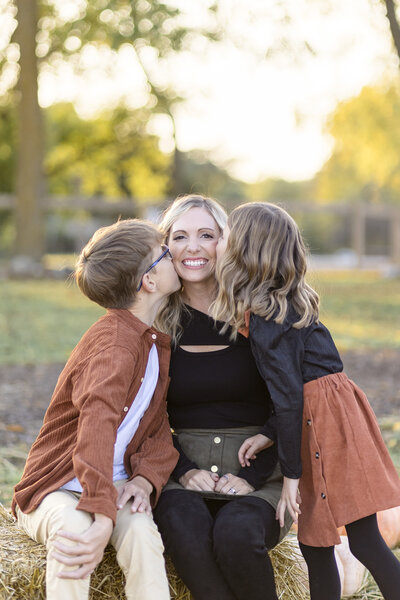 Little girl twirling her dress in front of the Lagoons at Riverside Park in Grand Rapids, West Michigan Portrait Photography.