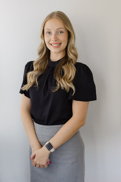 Office headshots with young female from a financial planning company.