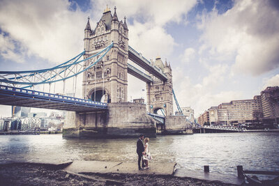 couple engagement photos near a bridge