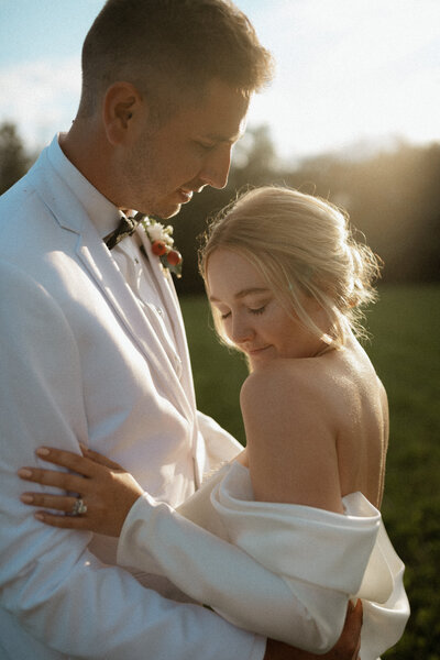 two brides embracing