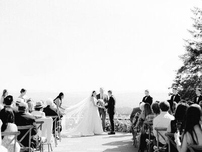 bride and groom on the terrace for their amaterra winery wedding ceremony
