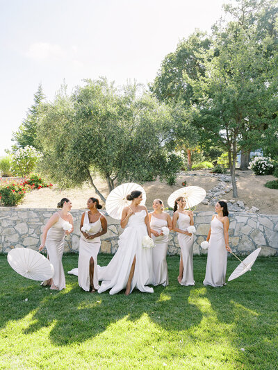 bride and groom arm in arm celebrate walking back from ceremony