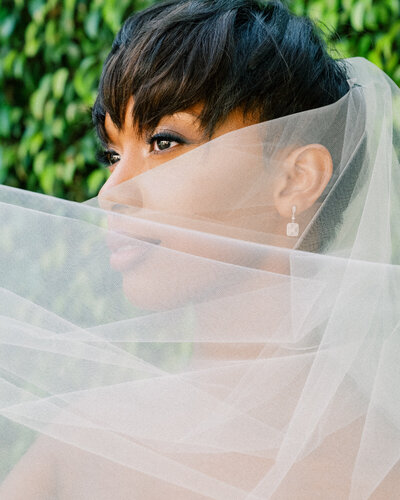 bride face coved with veil