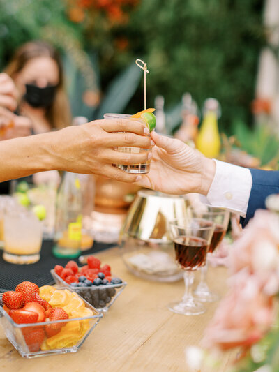 Cocktail handed to wedding guest