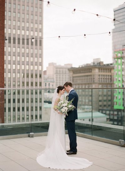 Bride and groom walk up memorial steps at their DC wedding