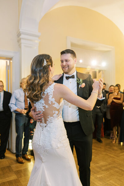 Bride and groom share a first dance together inside the Josephine Butler Parks Center