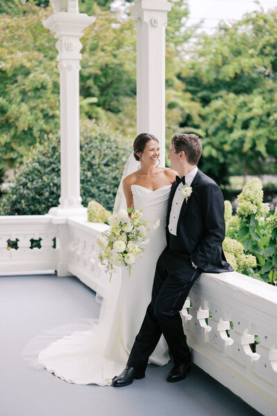Bride and groom walk up memorial steps at their DC wedding