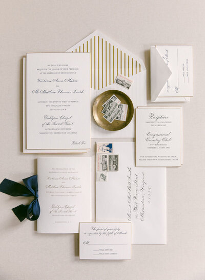 Gold and black engraved wedding invitation suite with gold foil envelope liner and gold beveled edges