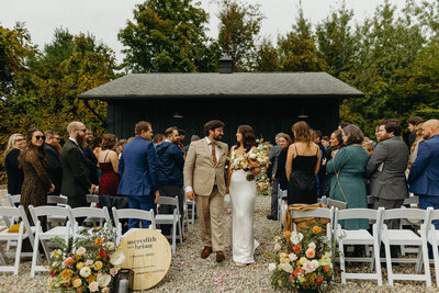 Couple exiting their wedding ceremony - UME (New England Wedding Planner)