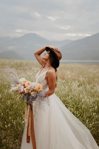 Lavender and tangerine boho inspired elopement, modern A-Line lace and organza bridal gown from from Lovenote Bride, a modern bridal boutique based in Calgary + Vancouver. Featured on the Brontë Bride Blog.