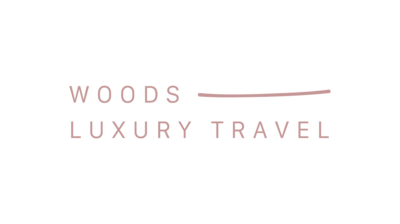 Text based logo with words "Woods Luxury Travel"