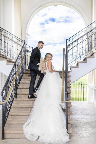 Bride and groom stairs