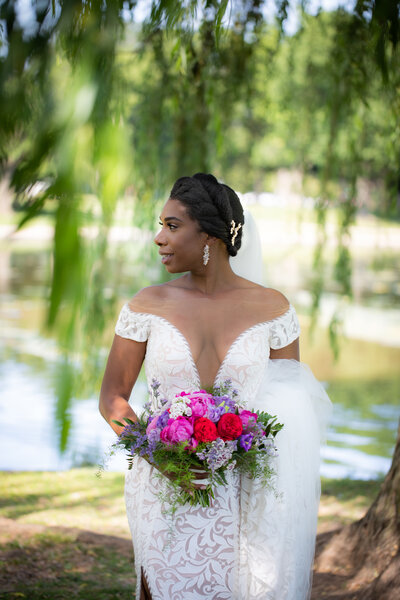 Vibrant and organic wedding flowers. Bouquet with fuchsia and lavender blooms.