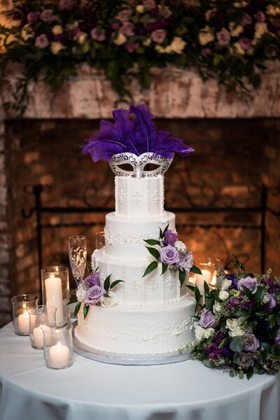 Wedding cake with Mardi Gras mask at Broussard's in New Orleans