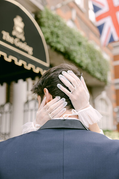 A wedding day photo of the couple in front of the Goring Hotel in London the United Kingdom