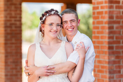 closeup portrait of young married couple smiling