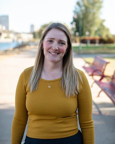 Smiling Colorado Springs wedding and portrait photographer Abby Sue.