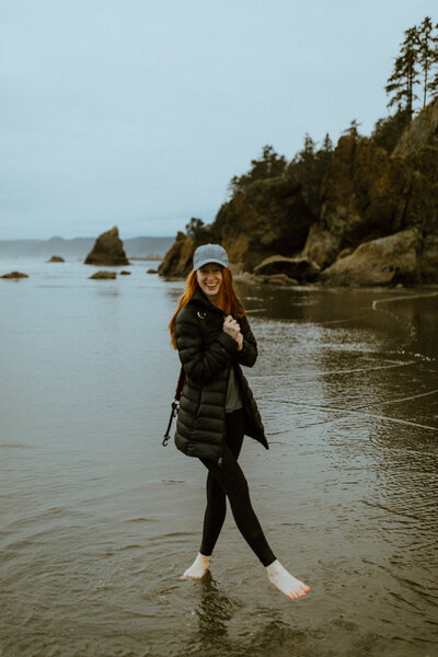 women plays in ocean at olympic national park