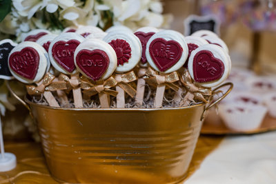 White Cookies with Red Heart Shaped Decorations