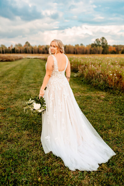 ohio bride looks back at photographer over her shoulder