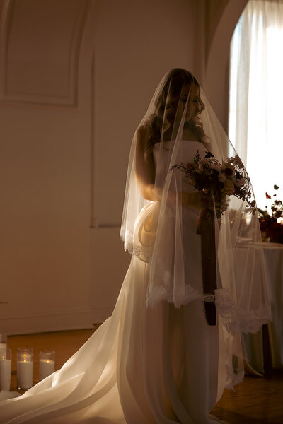 "Bride and groom celebrate their elegant luxury wedding at the historic Cottonwood Hotel in Omaha, NE – timeless moments captured by Tori Nichole Photography. A perfect blend of sophistication, romance, and architectural charm, showcasing the couple's love story in an unforgettable setting.