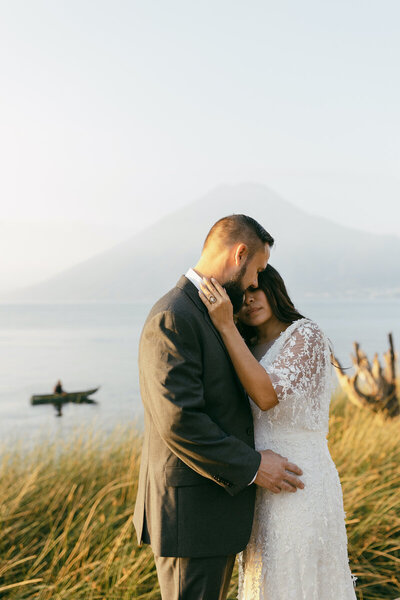 groom holding bride on elopement day