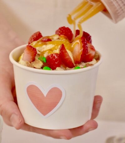 Drizzled syrup on fresh ice cream cup