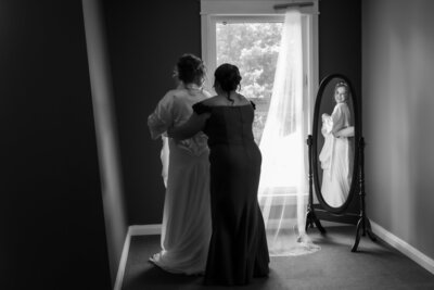 photo of bride looking at groom during speeches on wedding day