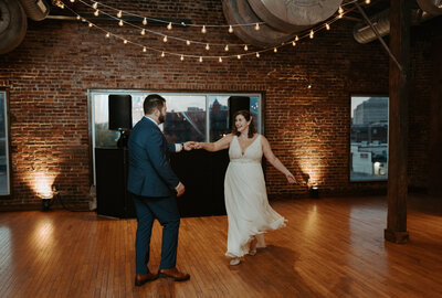 bride and groom sharing first dance