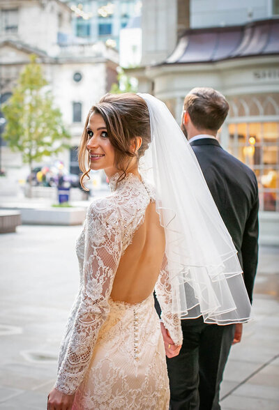 Bride in London street walking