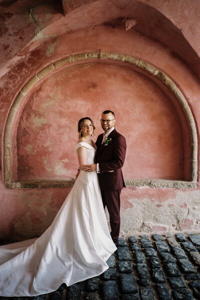 A 35mm film photograph of a couple wearing wedding attire at Meldrum House in Aberdeenshire.