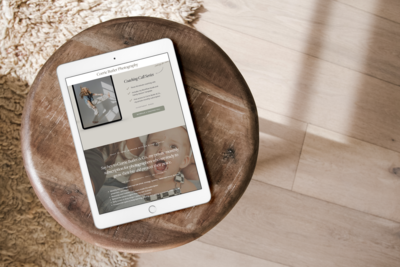 iPad mockup on a wooden stool