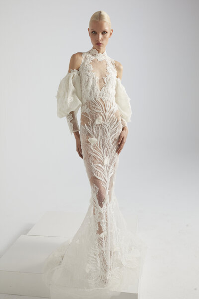 black and white image bride wearing feathered wedding dress
