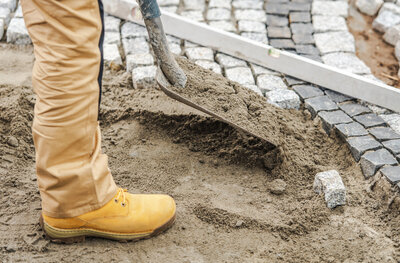 contractor-preparing-ground-for-laying-paving-ston-2023-11-27-05-04-50-utc