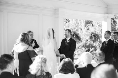couple laughing during wedding ceremony