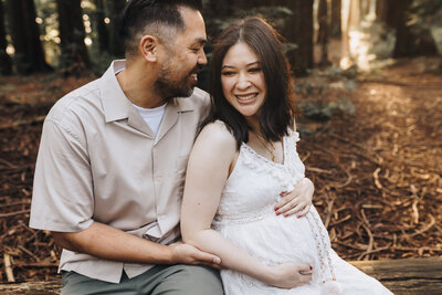 Mom showing off her baby bump in a boho white coverup at bay area studio