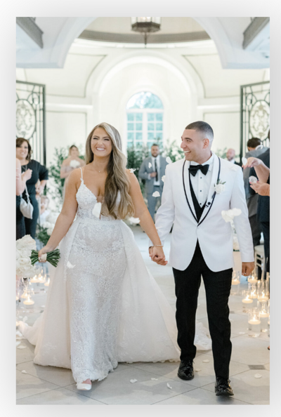 Bride and groom walk down the aisle at Shadowbrook Estate wedding