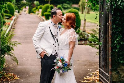 bride and groom in botanical gardens at house of an art lover