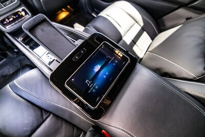 mercedes-maybach-gls-600-kalahari-gold-black-for-rent-in-miami-rear-console-screen