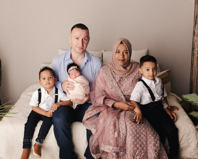 family portraits with a newborn baby during a studio session in shelby township mi