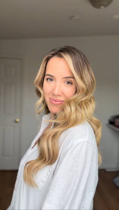Bride with bold makeup and dramatic Hollywood waves — glamorous bridal beauty created by Klover Beauty’s Maryland team.