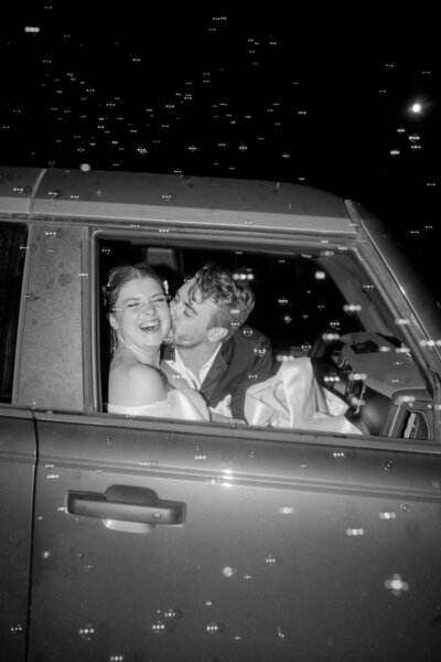 bride & groom joyfully smiling at the camera