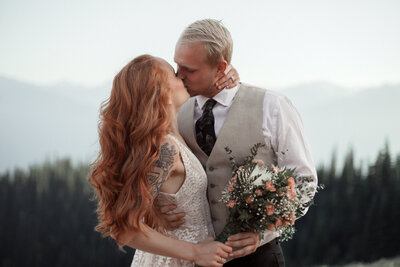 bride and groom kissing