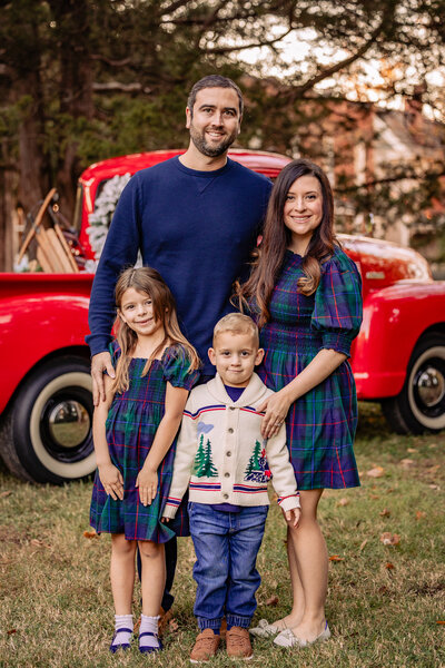 Little boy in red truck