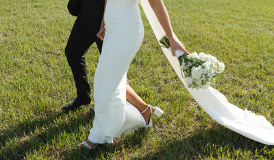 couple laying in grass