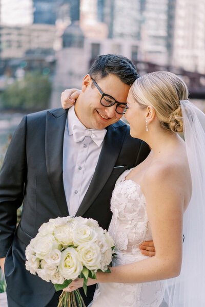 bride and groom laughing portrait