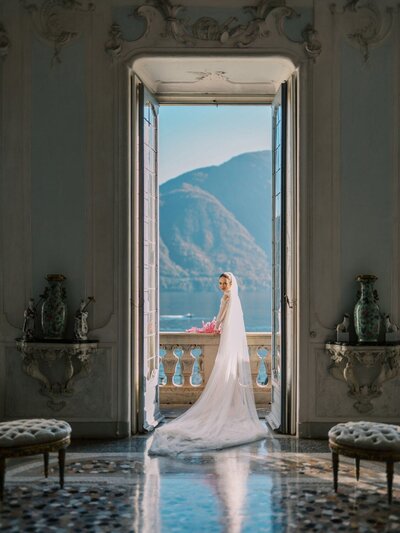 Villa Sola Bride in an ornate room iin villa Sola Cabiati, overlooking Lake Como, captured by Lake Como wedding photographer Andreas K. Georgiou