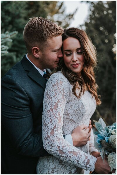 Lake Tahoe Elopement Photographer captures groom whispering to bride